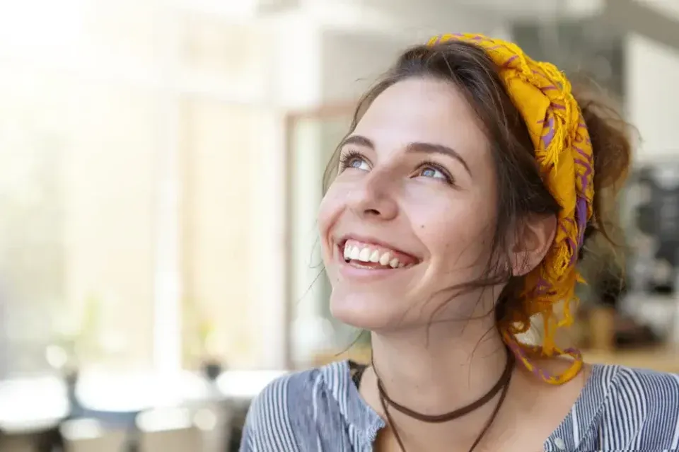 Smiling woman looking relaxed and content