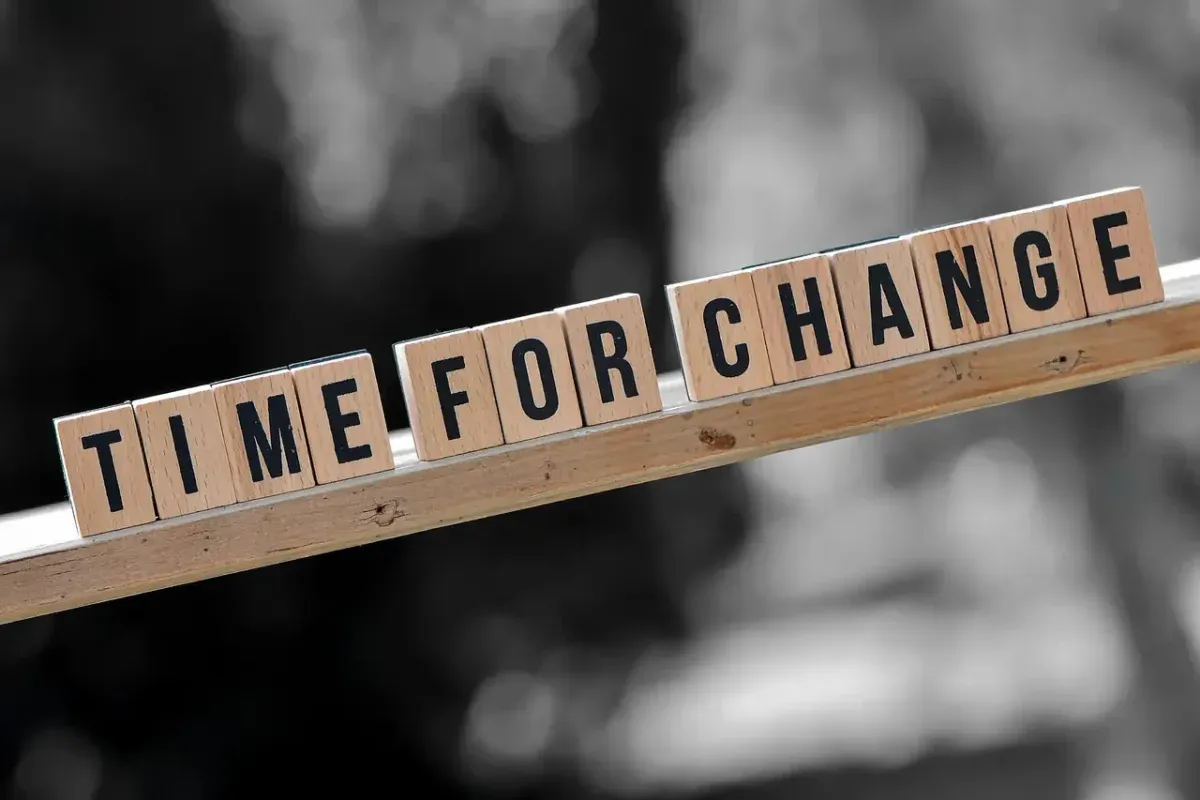 Wooden blocks spelling out "TIME FOR CHANGE"