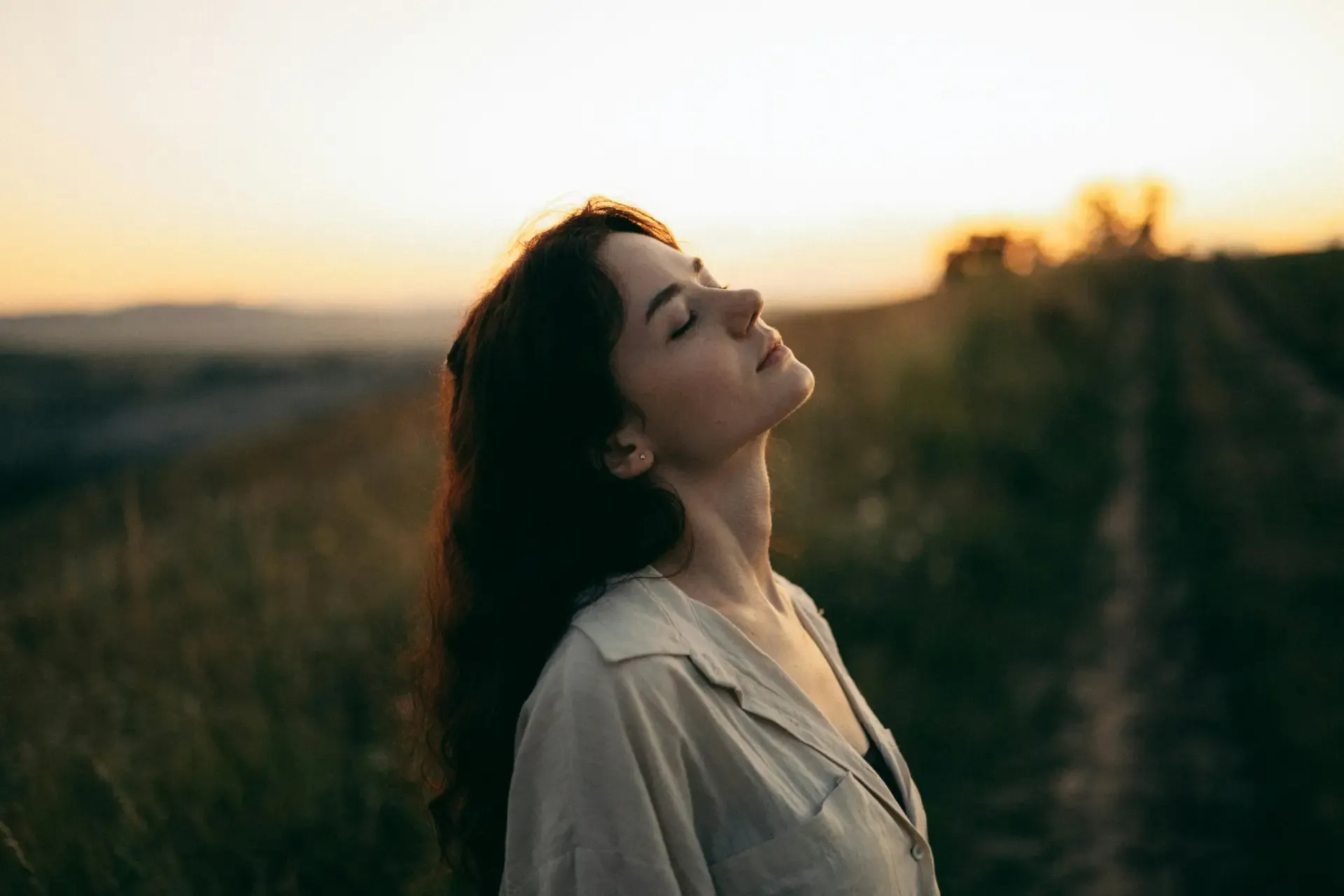 Woman looking up toward the light
